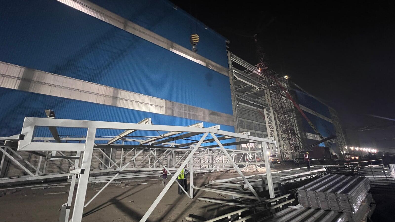 Architectural standing seam roofing for Lodha Mumbai: Premium metal building envelope featuring a minimalist aesthetic and hidden fastener technology by Rishonn & Reyansh.